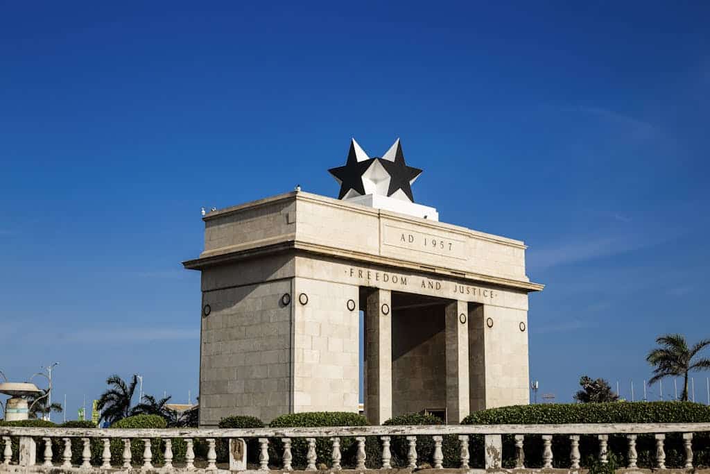 Stunning view of Independence Arch against a clear blue sky in Accra, Ghana.