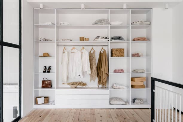 Transform Your Space - Wardrobe Design Ideas NZ 2026 4 Hanging closet organiser with shelves for jumpers and bags
