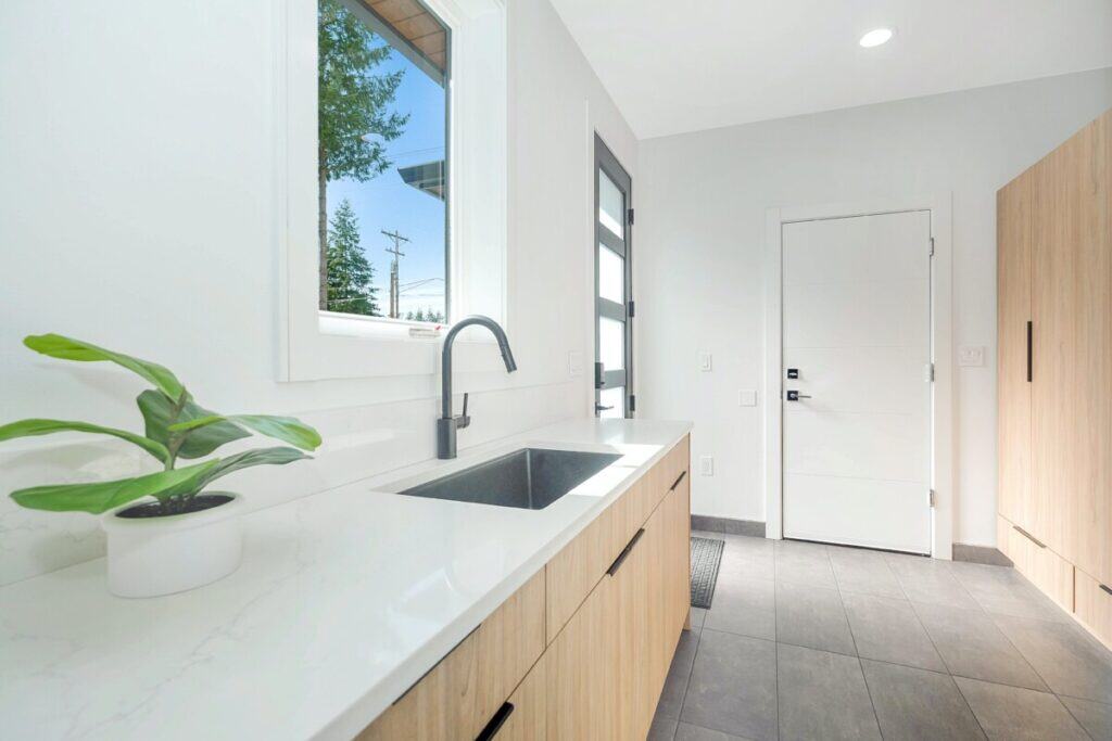 Custom laundry cabinetry in an Auckland home with natural light and good ventilation