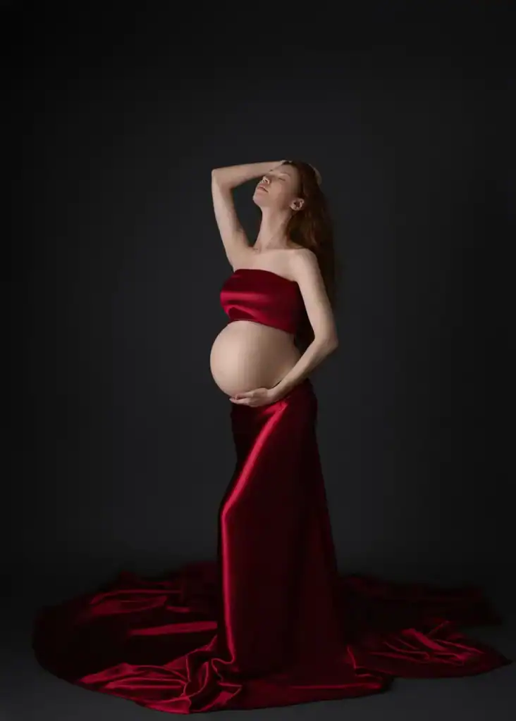 Bold and modern maternity portrait in dramatic lighting – fashion maternity session Edmonton
