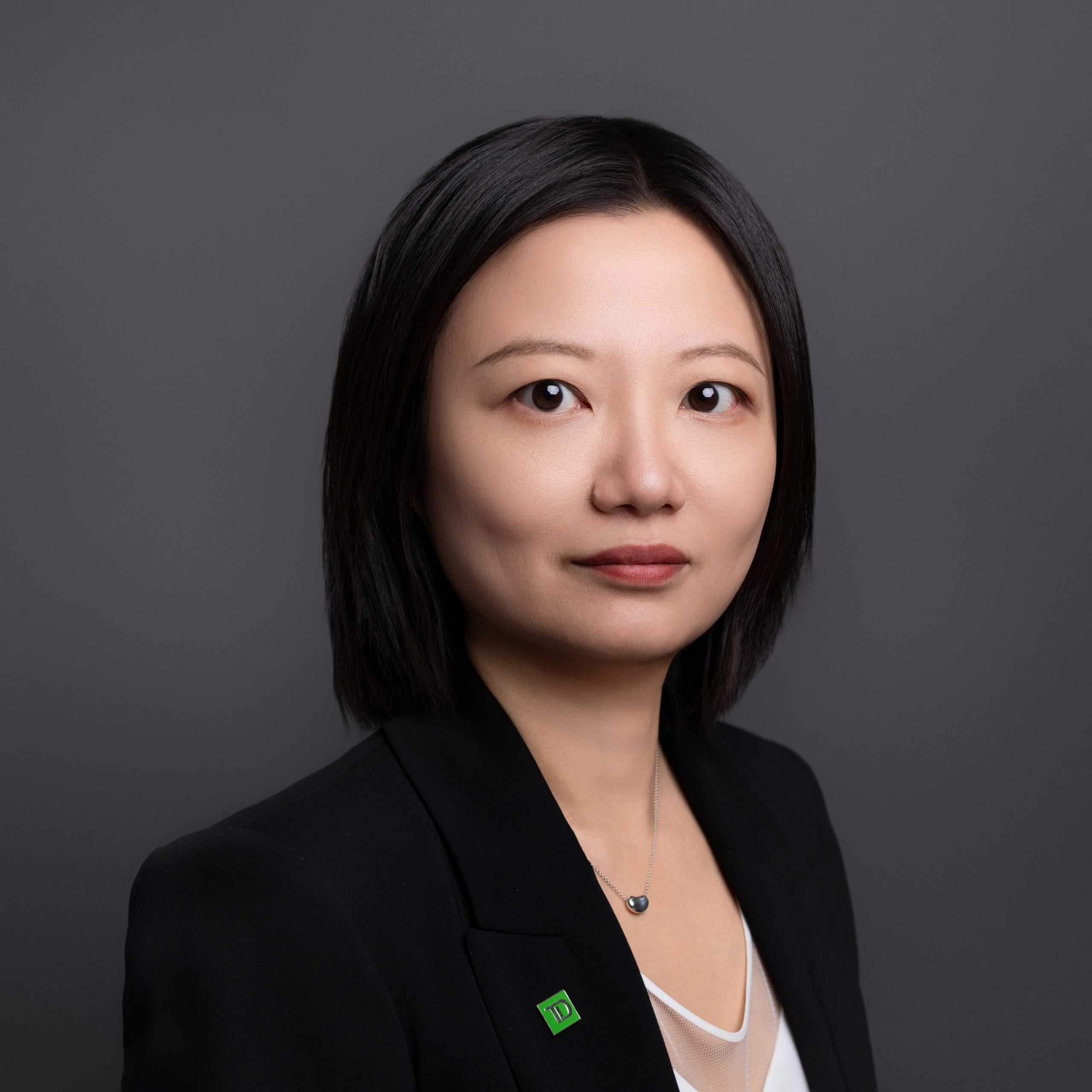 grey background business headshot taken in Edmonton 