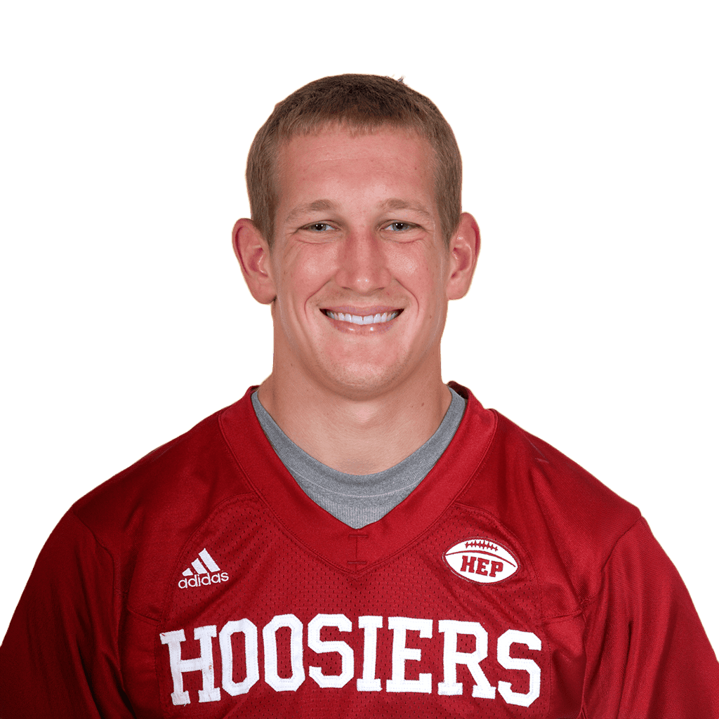Lou Groza Award candidate in a red Hoosiers football jersey smiling at the camera.