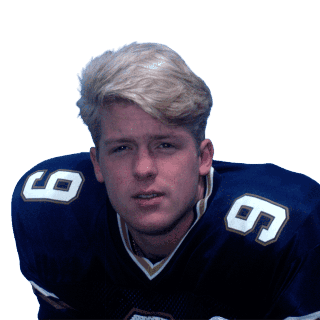 Young football player in blue jersey with number 9, focused and ready to play.