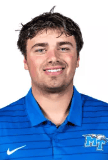 Young male athlete in blue sports jersey smiling for Lou Groza Award photo.