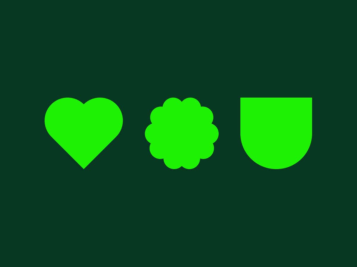 Dark green background featuring three vivid green shapes: a heart, a scalloped-edge flower-like form, and a shield. The design brings to mind the vintage appeal of an old Bethnal Green working mens club.