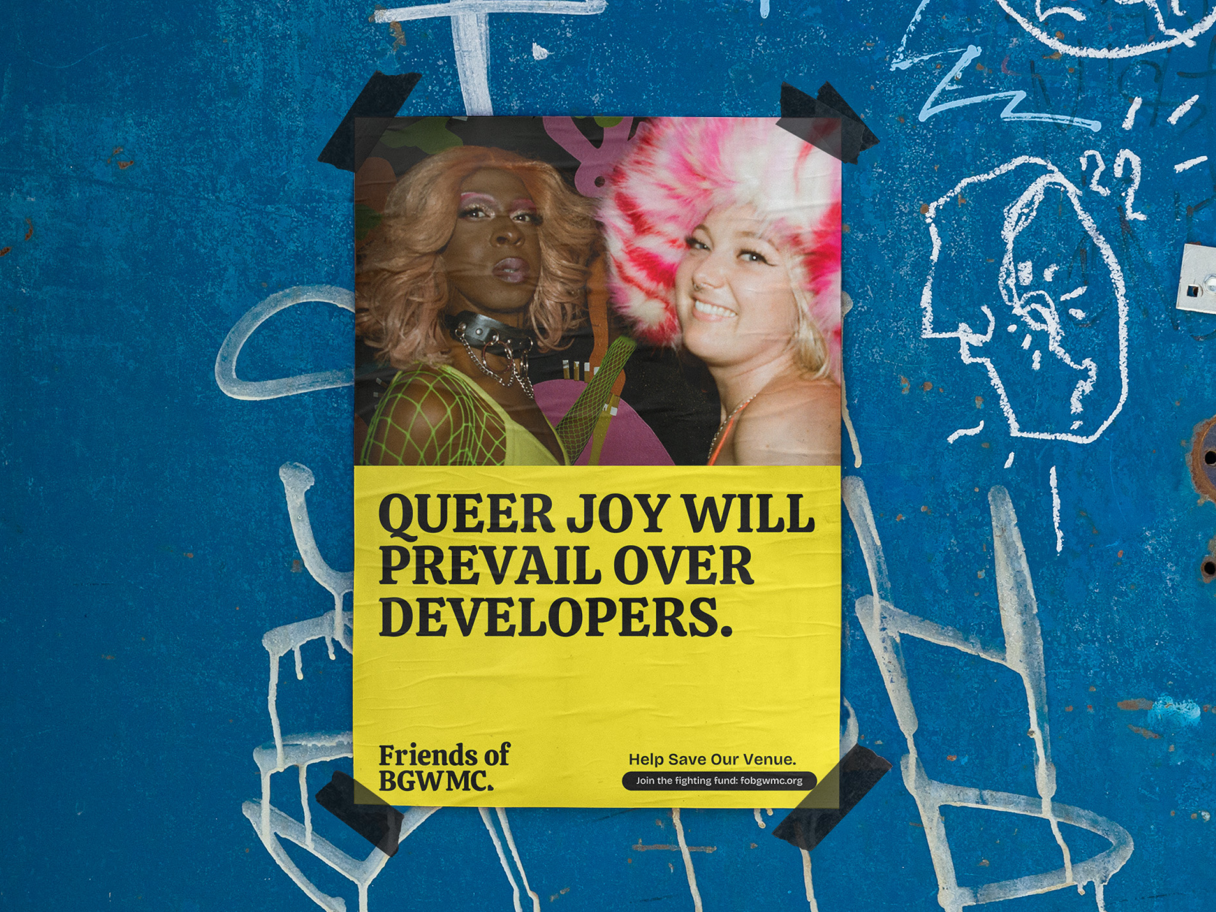 A poster on a wall that says queer joy will prevail over developers.
