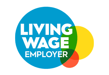Living Wage Employer logo in bold white on a large blue circle, with overlapping yellow, green, and orange circles on a pale background.