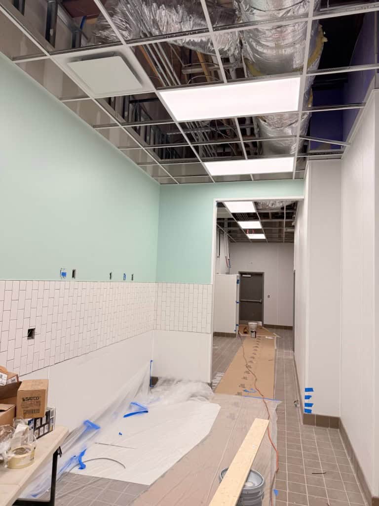 Tropical Smoothie Cafe Covington GA — ceramic wall tile installation during restaurant build-out by Modern Day Commodities