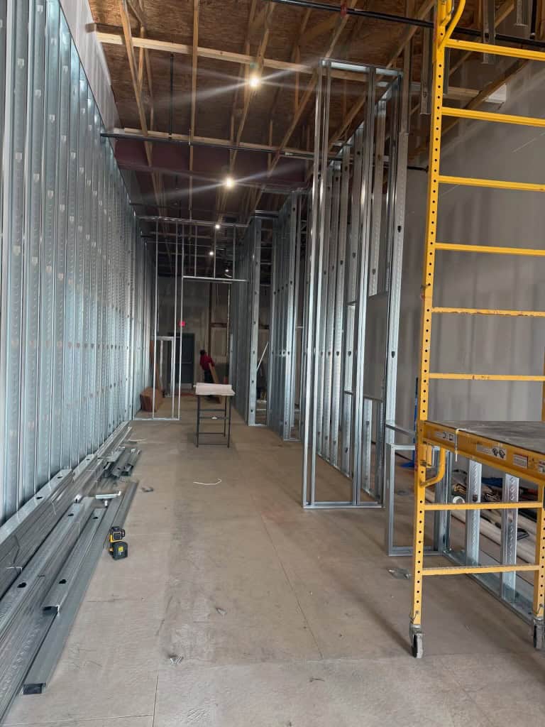Tropical Smoothie Cafe Covington GA — metal stud wall layout during restaurant build-out by Modern Day Commodities