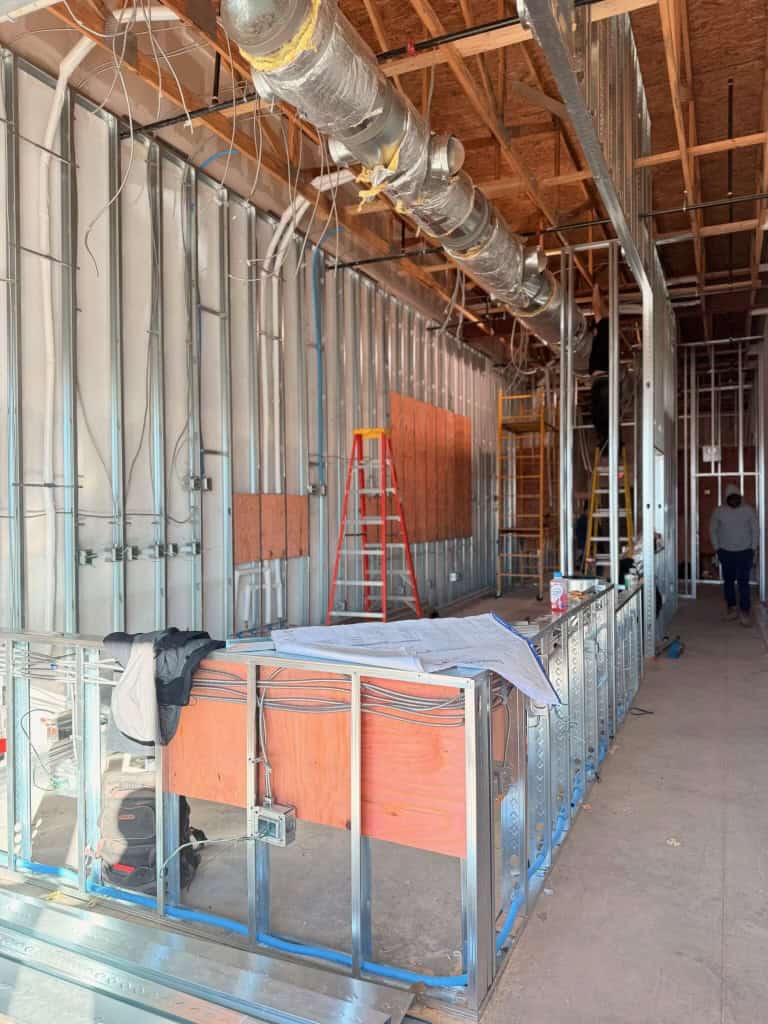 Tropical Smoothie Cafe Covington GA — kitchen wall framing during restaurant build-out by Modern Day Commodities