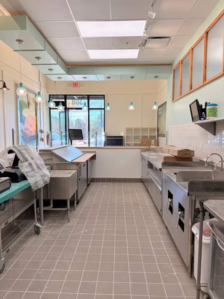 Tropical Smoothie Cafe Covington GA — millwork installation during restaurant build-out by Modern Day Commodities