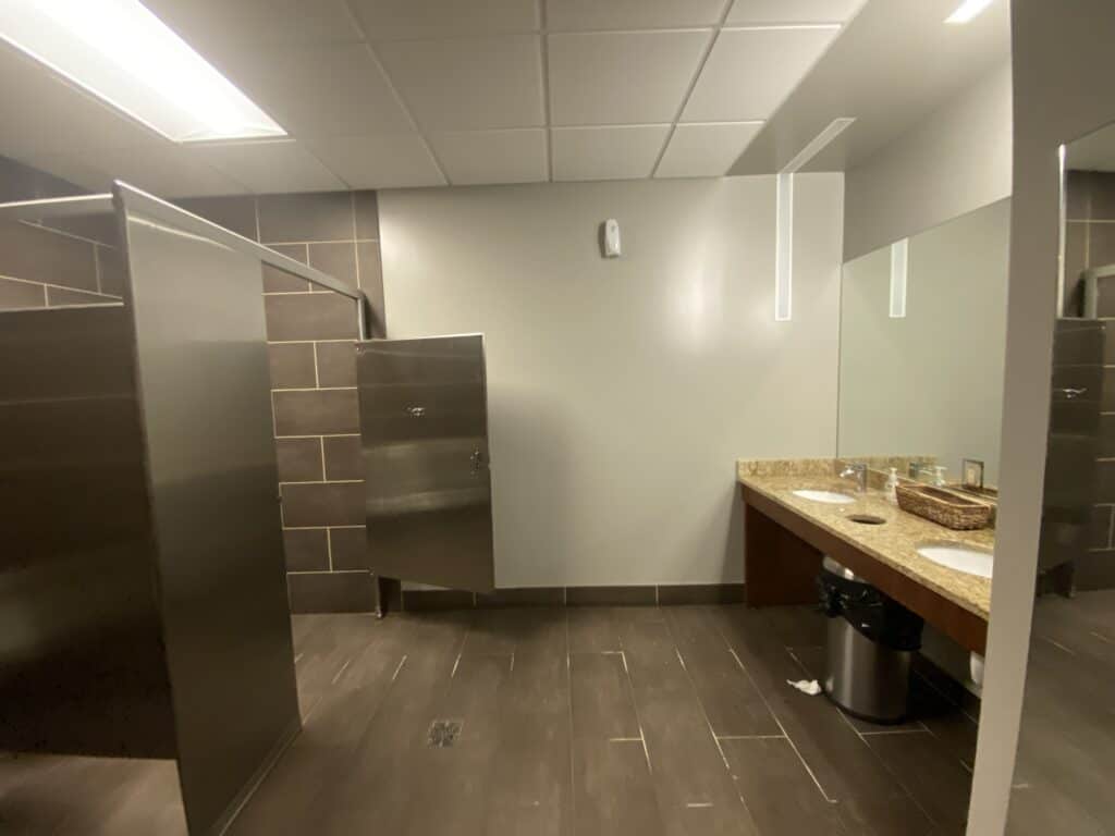 Open office area during construction with exposed ACT ceiling grid - tenant improvement Dunwoody GA