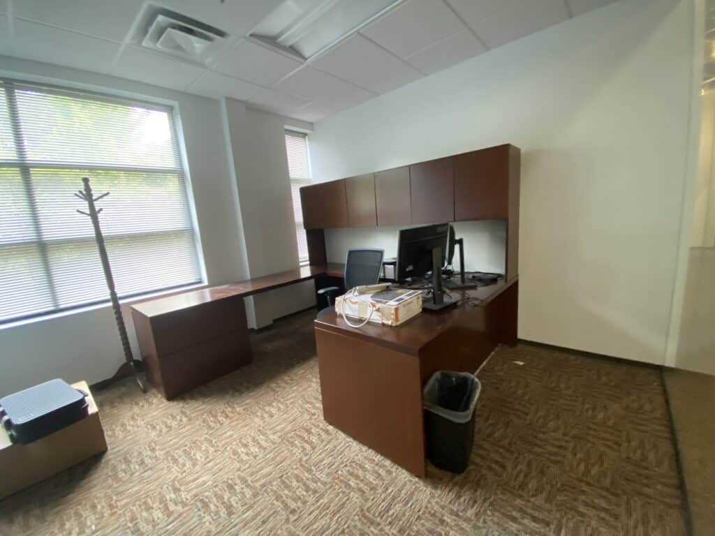 Private office with guest seating and commercial carpet - tenant improvement contractor Dunwoody GA