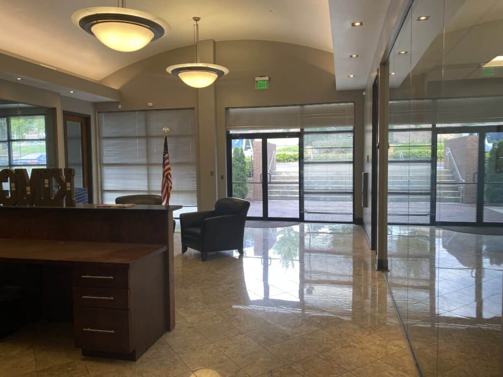Completed Kemco office build-out showing finished interior spaces doors hardware and ceiling grid Dunwoody GA