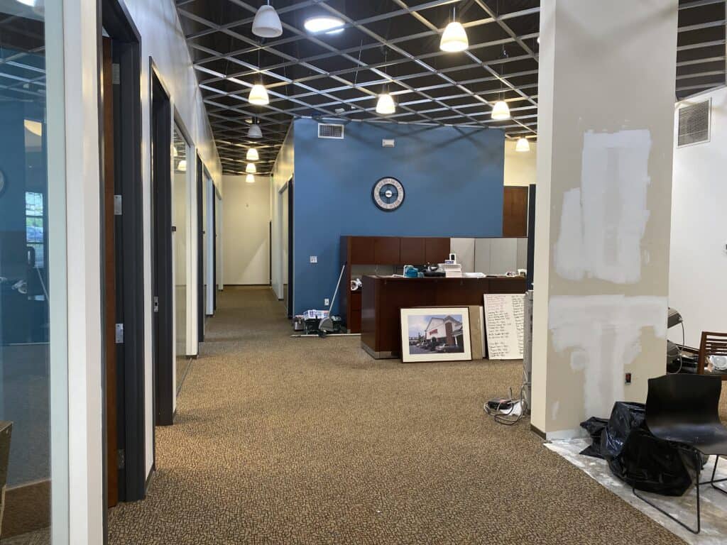 ACT ceiling grid installation in commercial office space - office build-out contractor Dunwoody GA