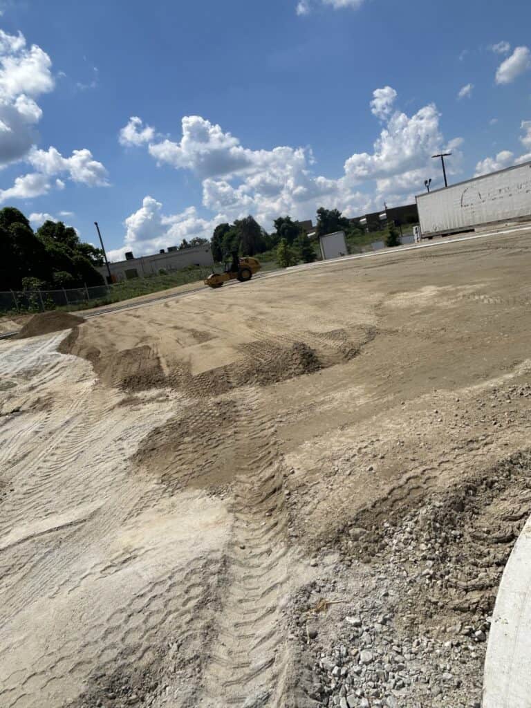 Site grading and aggregate base preparation during Ross Dress for Less exterior sitework Decatur GA
