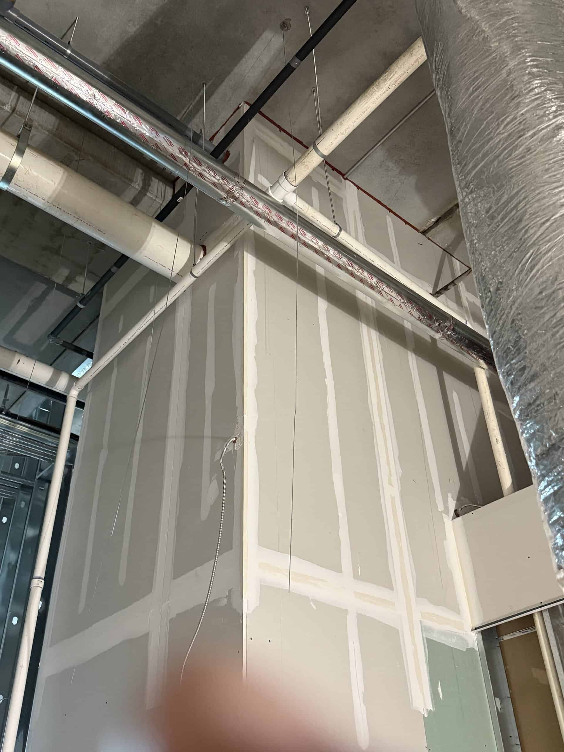 Brews and Hops Taproom Chamblee GA - acoustical ceiling grid installation during first-generation tenant improvement by Modern Day Commodities