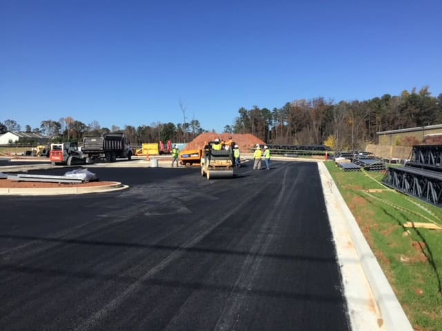 Lidl supermarket Decatur GA — asphalt parking lot paving during ground-up commercial construction by Modern Day Commodities