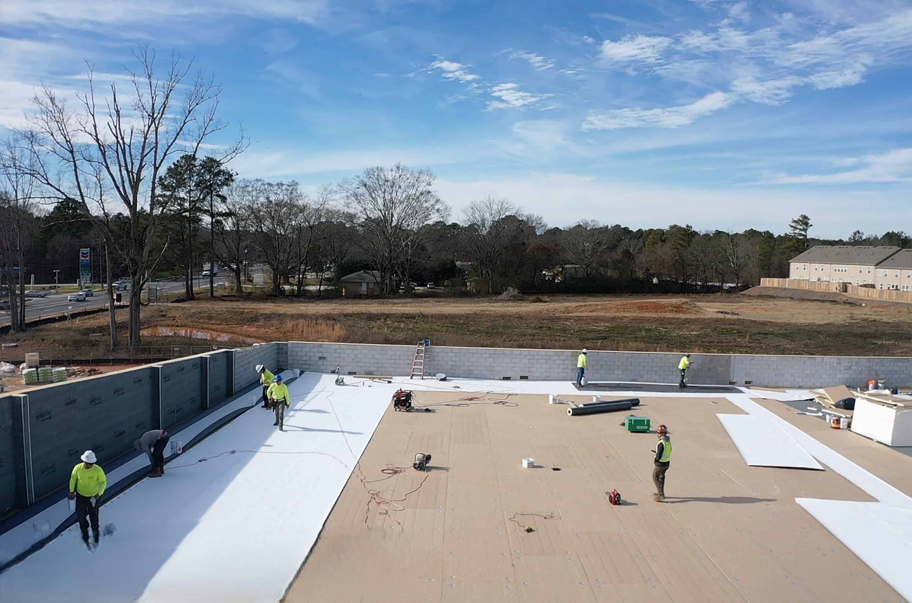 Lidl supermarket Decatur GA — TPO roof membrane installation during ground-up commercial construction by Modern Day Commodities