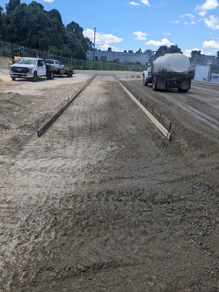 Parking lot paving and site work detail during Ross Dress for Less construction Decatur GA