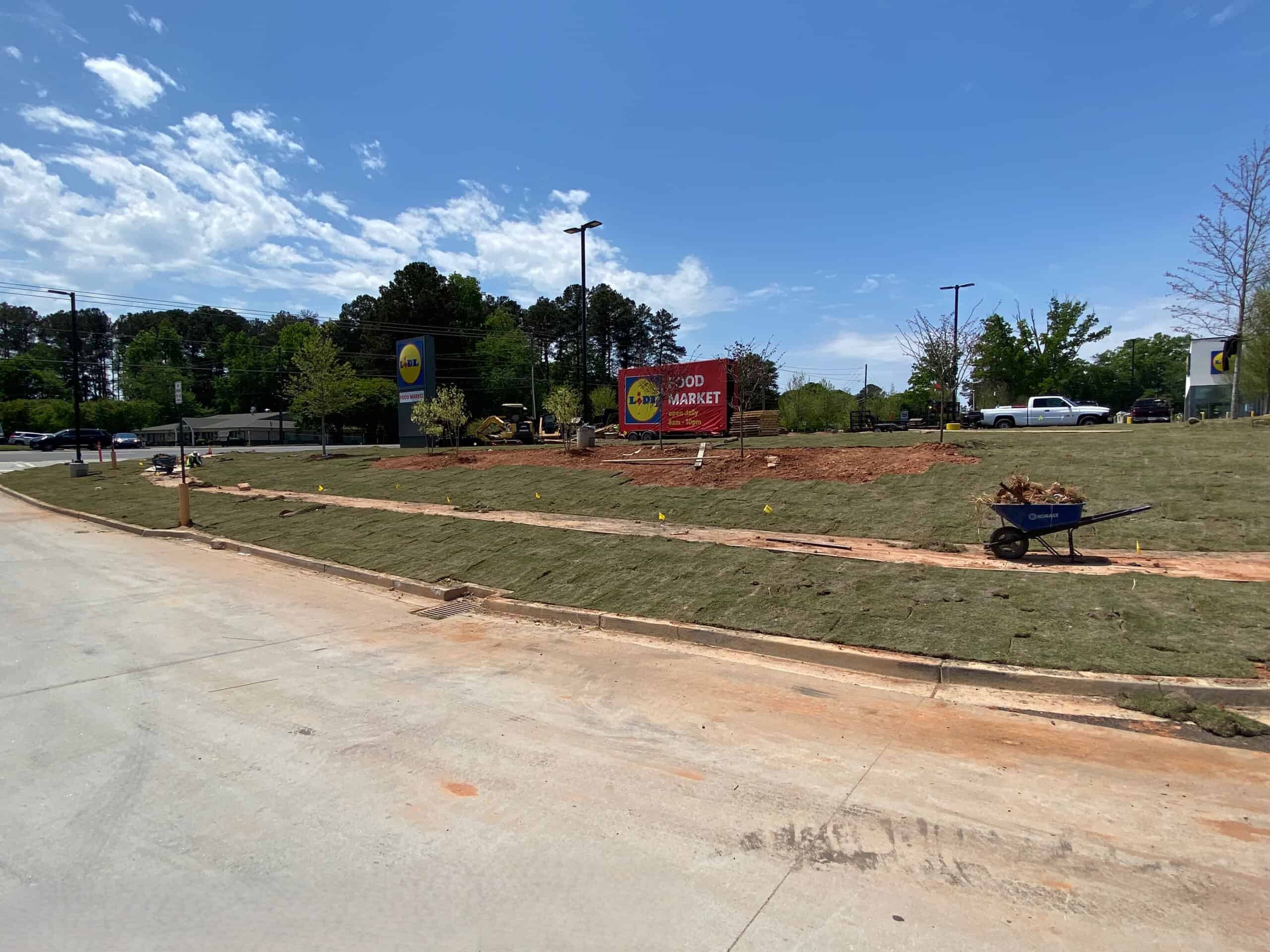 Lidl supermarket Decatur GA — site landscaping and sod installation during ground-up commercial construction by Modern Day Commodities