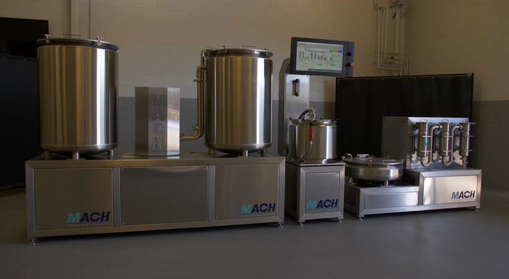 High-tech industrial equipment for manufacturing, stainless steel machinery, automation tools from Mach Technologies.