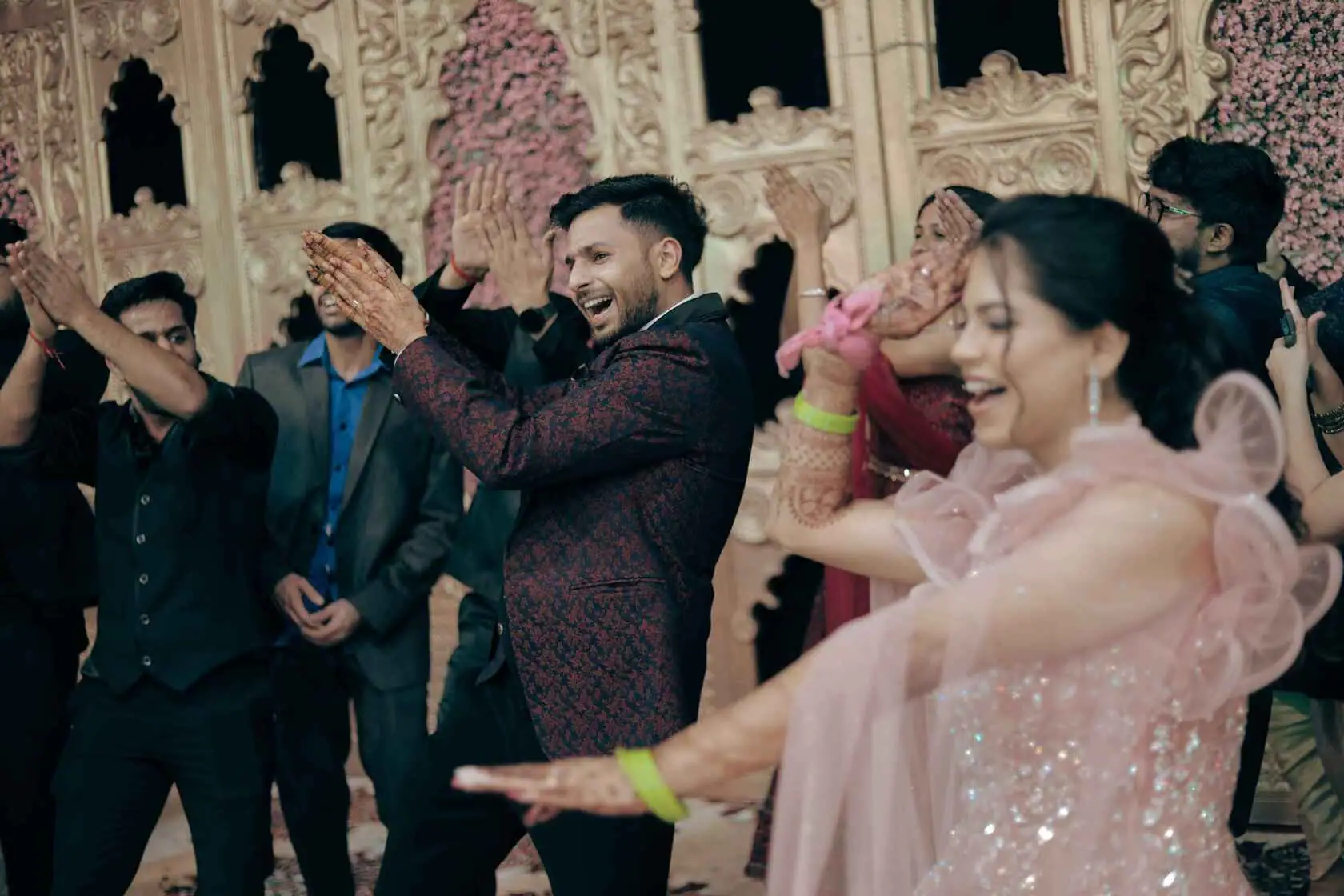 Groom and Bride Dancing at Grand Wedding Celebration