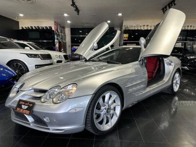 Mercedes-Benz SLR 2006 a high-performance grand tourer, a collaboration between Mercedes-Benz and McLaren, featuring a 5.4-liter supercharged V8 engine producing around 617 horsepower
