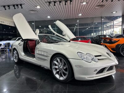 Mercedes-Benz SLR 2005 a high-performance grand tourer, a collaboration between Mercedes-Benz and McLaren, featuring a 5.4-liter supercharged V8 engine producing around 617 horsepower