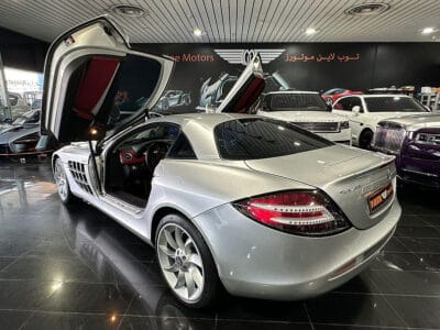 Mercedes-Benz SLR 2006 a high-performance grand tourer, a collaboration between Mercedes-Benz and McLaren, featuring a 5.4-liter supercharged V8 engine producing around 617 horsepower