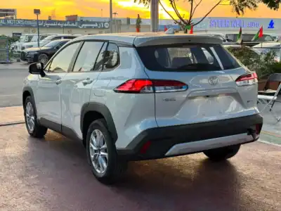 2025 Toyota Corolla Cross Hybrid 4 Cylinders Engine White Black Crossover