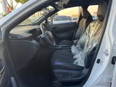 2025 Toyota Corolla Cross Hybrid 4 Cylinders Engine White Black Crossover