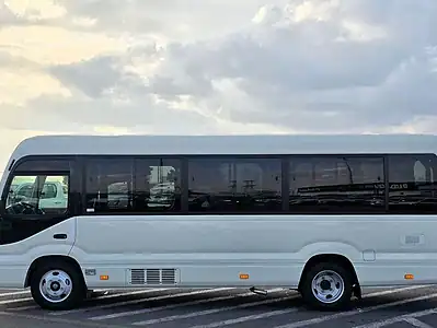 2026 Toyota Coaster VIP 4.2l diesel MT 22 Seats Electric Door White Brown