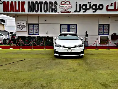 2018 Toyota Corolla XLI 4 Cylinders Engine Petrol White Beige Sedan