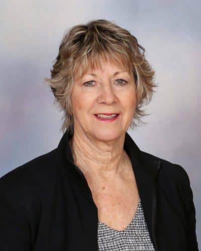 Friendly woman headshot, professional portrait for Mangorei School community.