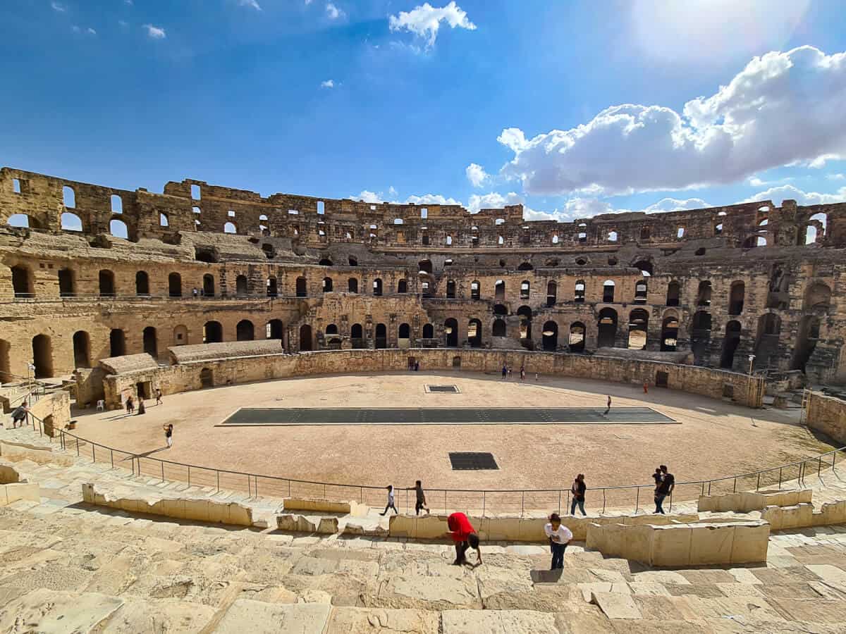 View of the interior of El Jem Amphitheater, a UNESCO World Heritage site and one of the largest and best-preserved Roman amphitheaters in the world – a must-see historical site in Tunisia.
