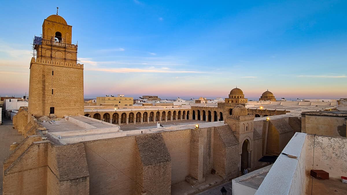Aerial view of the Great Mosque of Kairouan at sunset, one of the most sacred Islamic landmarks and historical places to visit in Tunisia.