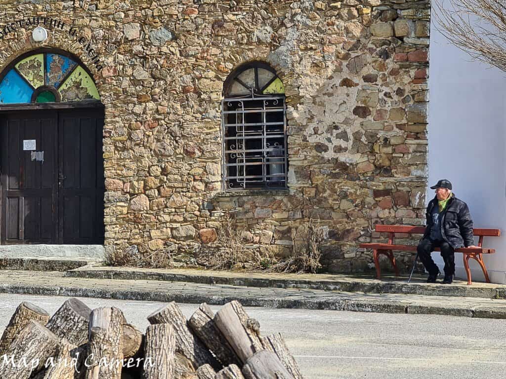 Constantine waiting for the next visitor in front of the church