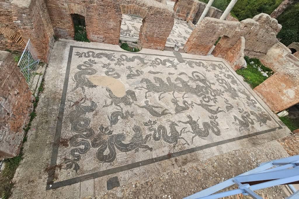 Detailed mosaic floor at Ostia Antica ruins, a highlight for those exploring Roman artistry.