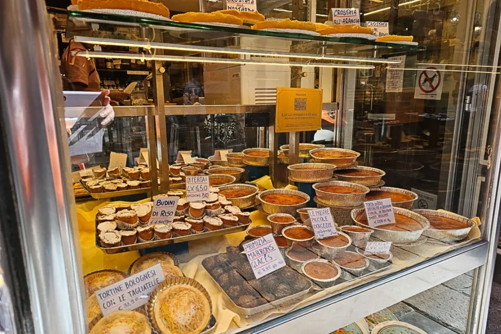 Traditional Bologna pastries including torta di riso, budini di riso, and tagliatelle cakes – must-try desserts and one of the most delicious things to do in Bologna for food lovers
