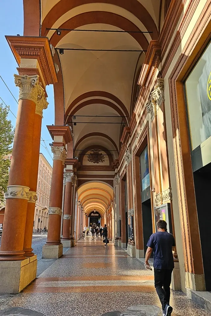 Elegant portico along Via Galliera in Bologna, Italy – a classic example of Bologna’s UNESCO-listed arcades and one of the most scenic things to do in Bologna on foot