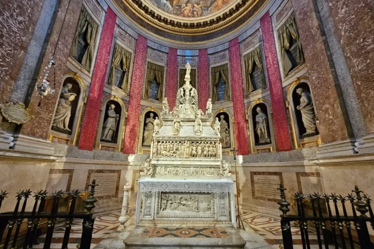 Marble tomb of Saint Dominic in Bologna’s Basilica of San Domenico, featuring works by Michelangelo—essential for those asking is Bologna worth visiting for art.