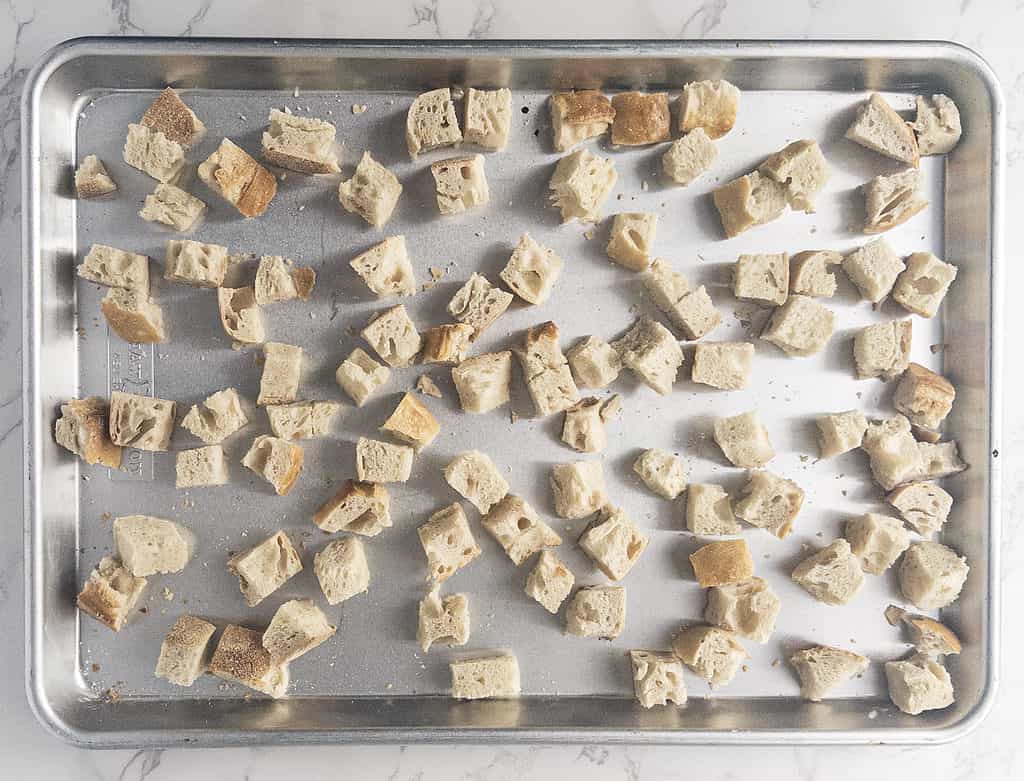 Bread cubes on sheet pan