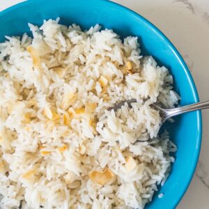 coconut rice in bowl with spoon