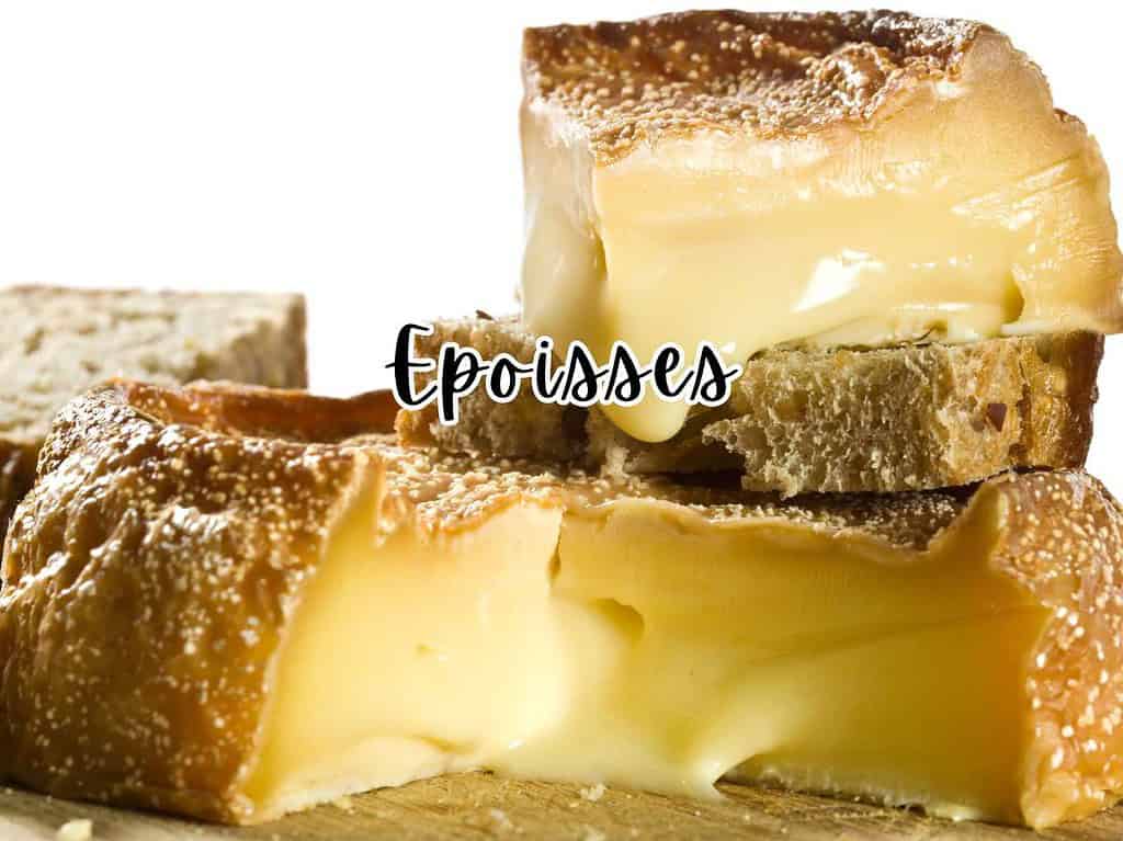 Epoisses cheese with slices of bread.