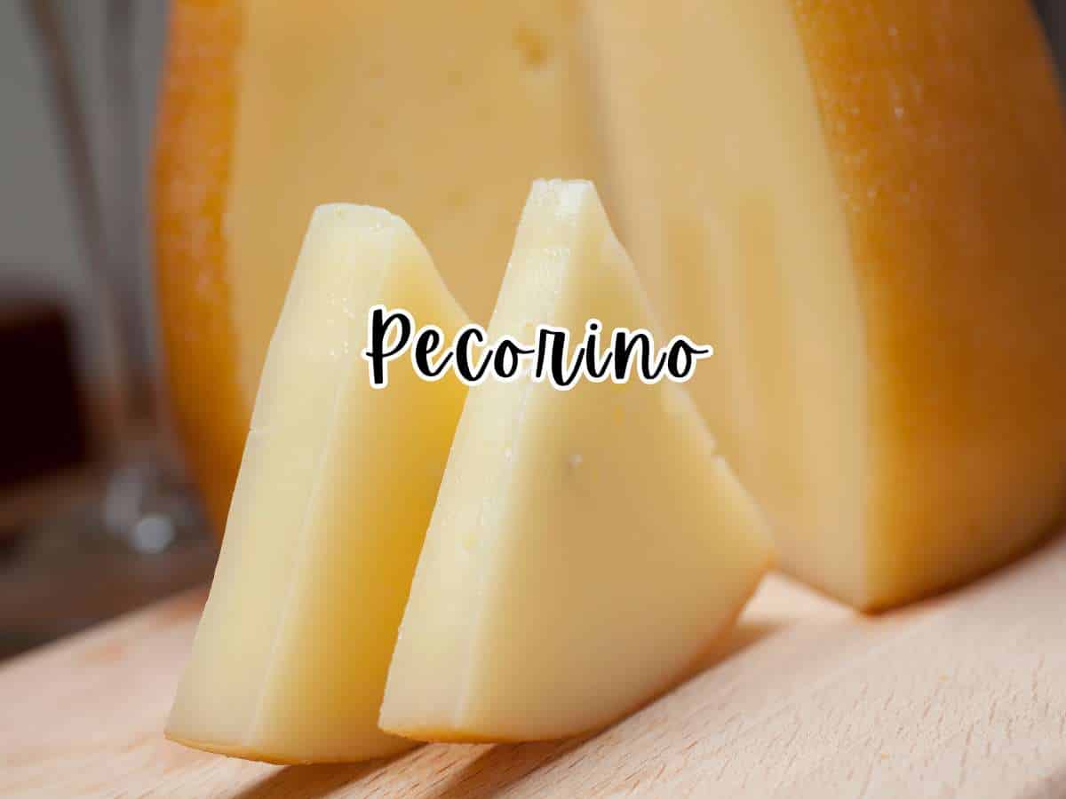 Wedges of Pecorino cheese on a wooden board.