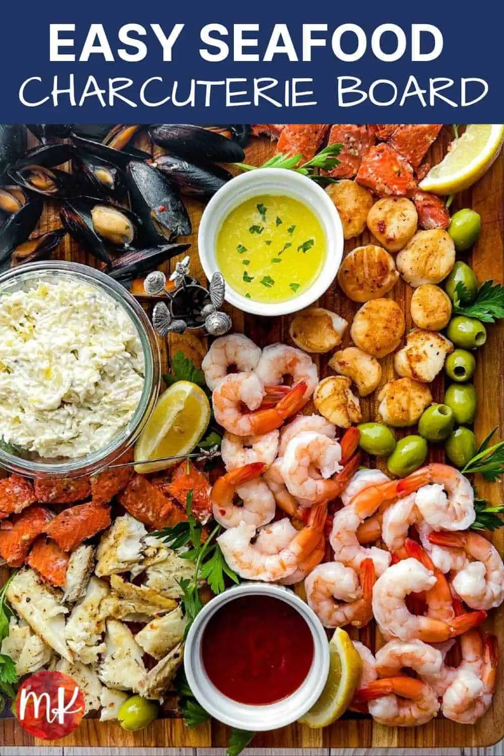 Prawns, salmon, scallops and mussels on a wooden cutting board with dipping sauces with title "Easy Seafood Charcuterie Board" at the top.