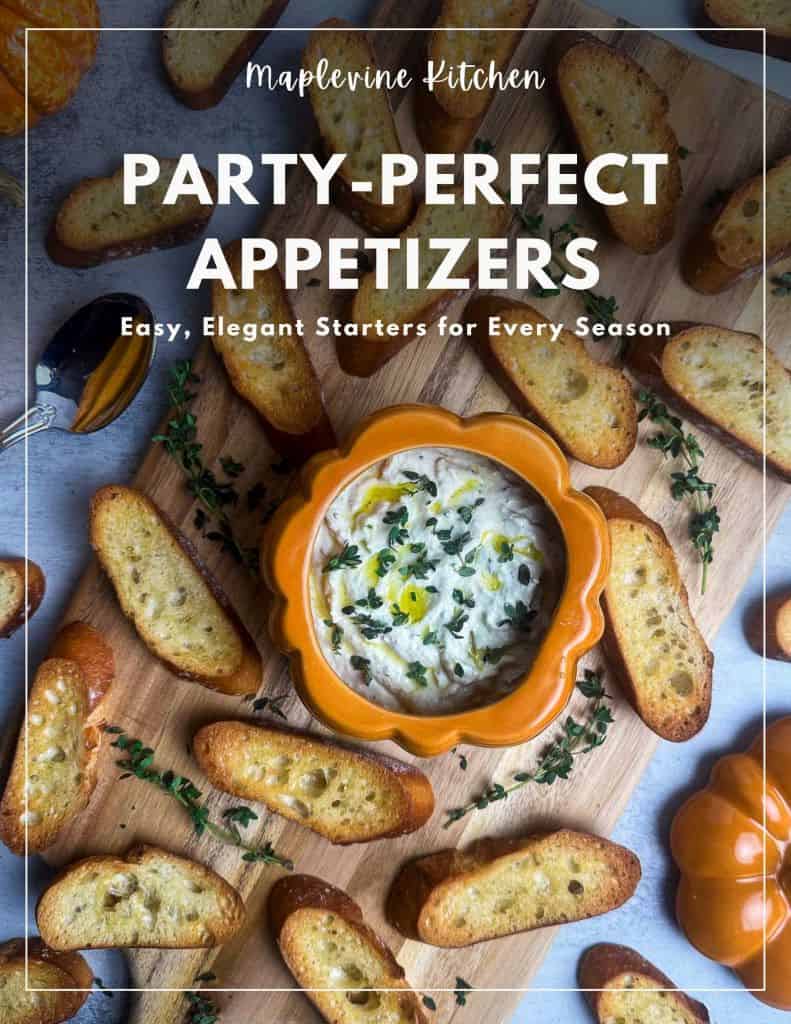 Party-Perfect Appetizers e-book cover with truffle burrata dip and crostini in the background.