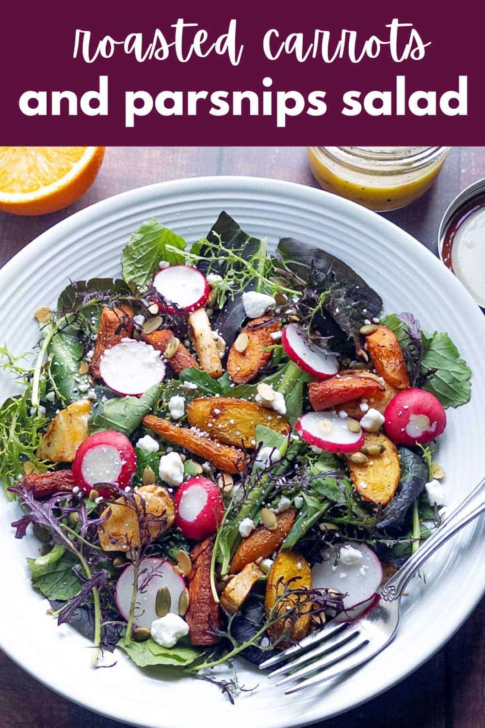 Pinterest pin image for roasted carrot and parsnip salad with citrus dressing in a white plate with a fork on the side.