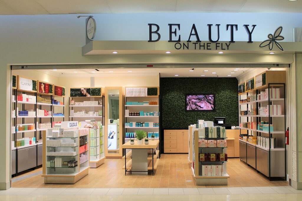 Beauty store interior with shelves of skincare and beauty products on display.